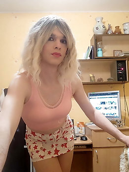 Sissy wearing A Large And Heavy Chastity Cage